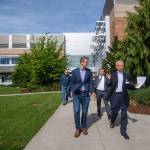 U.S. Rep. Derek Kilmer, left, and Olympic Medical Center CEO Eric Lewis walk through OMCs Sequim Campus in May. (Jesse Major/Peninsula Daily News)