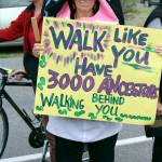 Terry Dubeau of the North Olympic Orca Pod stands with her sign while at the Global Climate Change rally that Port Townsend High School students led Friday morning. (Zach Jablonski/Peninsula Daily News)