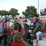 Climate Strike participants gather at the playground at Port Angeles City Pier before marching through the streets of Port Angeles on Friday evening. (Keith Thorpe/Peninsula Daily News)