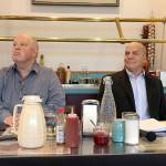 Doc Robinson, left, and Charlie McCaughan prepare to debate in a Port Angeles Business Association forum Tuesday morning at Joshuas Restaurant. (Rob Ollikainen/Peninsula Daily News)