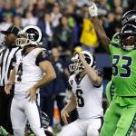 SEAHAWKS: By a whisker — Seattle wins when Rams’ kick goes inches wide