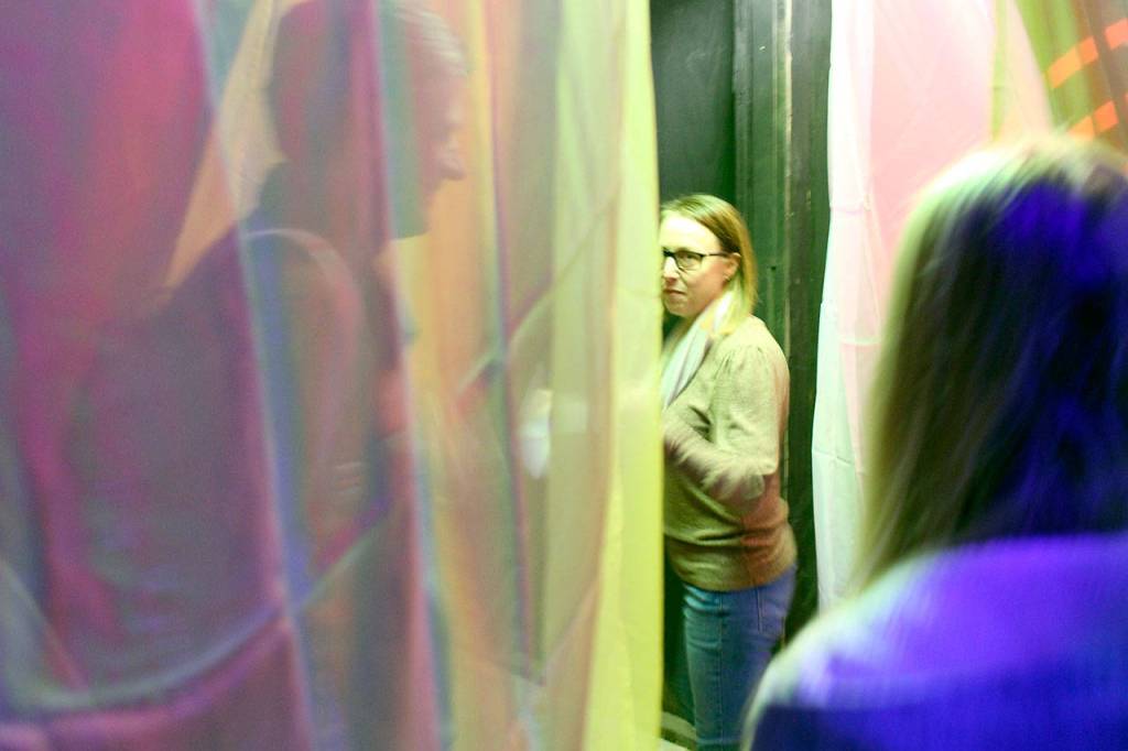 Haunt Town Haunt Mom Christy Spencer explains one of the sets to the haunts volunteers during the teams rehearsal Thursday night in the basement of the Elks Lodge. (Zach Jablonski/Peninsula Daily News)
