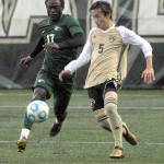 Peninsulas Teppei Teramoto, right vies foro ball control with Shorelines David Enow on Wednesday at Wally Sigmar Field in Port Angeles. (Keith Thorpe/Peninsula Daily News)