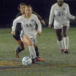 Peninsulas Grace Hipke, front, outruns Shorelines Julia Olvera as Hipkes teammate Tommylia Dunbar, right, looks on during Wednesday nights match at Wally Sigmar Field in Port Angeles. (Keith Thorpe/Peninsula Daily News)
