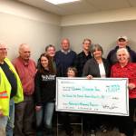 Members of the Peninsula Trails Coalition recently gathered to accept a check for $5,529 from race director Victoria Jones of the North Olympic Discovery Marathon. Pictured are, from left, Vice President Gordon Taylor, Bob Anundson, Jones, Treasurer John Dolansky, Andy Marr, Jan Whitlow, Vice President Bob Lake, Molly Erickson, Merrily Mount, Jeff Selby and Brian Anderson. Not pictured are Jeff Bohman, president of the Olympic Trails Coalition, and Bob Petersen, board member of the trails coalition.