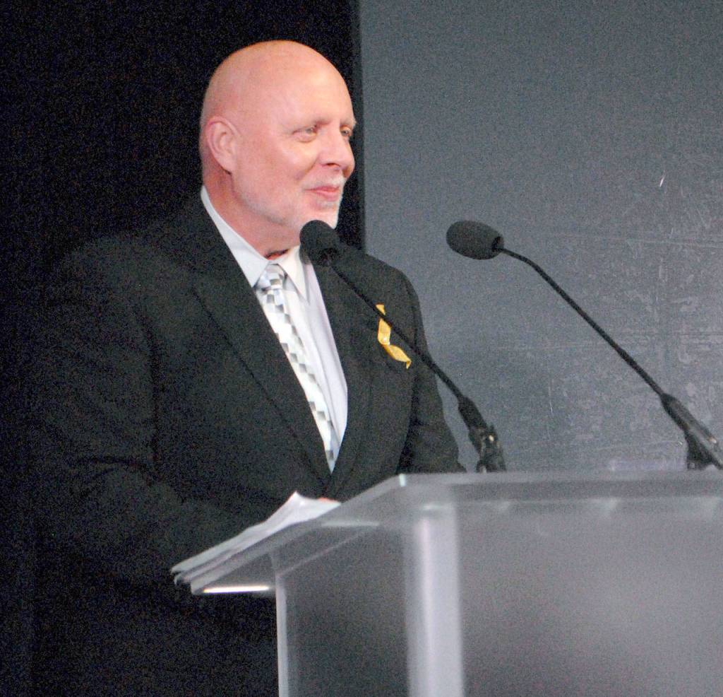Field Arts & Events Hall executive director Chris Fidler speaks during Friday nights gala groundbreaking event at the project site in Port Angeles. (Keith Thorpe/Peninsula Daily News)