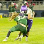 Michael Dashiell/Olympic Peninsula News Group Port Angeles Derek Bowechop tackles a Sequim runner during the Rainshadow Rumble on Friday night at Civic Field.