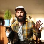 Actor Dillon Porter rehearses for Walt Whitman 200, his production starting Thursday at Port Townsends Chameleon Theater. Spice the cat provided criticism. (Dillon Porter)