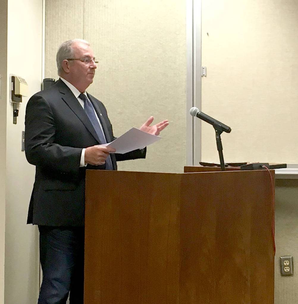 Dan Gase, Port of Port Angeles airport manager, speaks at the port commissioners meeting Tuesday. (Rob Ollikainen/Peninsula Daily News)