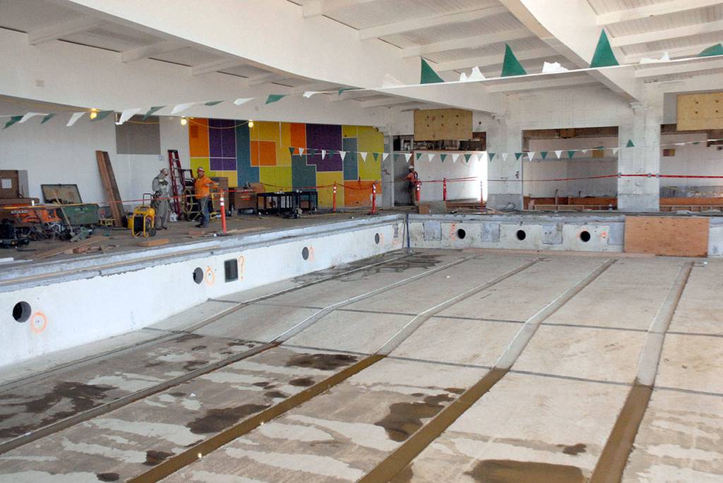 The original swimming pool awaits eventual renovation as work continues to expand and improve the former William Shore Memorial Pool, now renamed the Shore Aquatic Center. (Keith Thorpe/Peninsula Daily News)