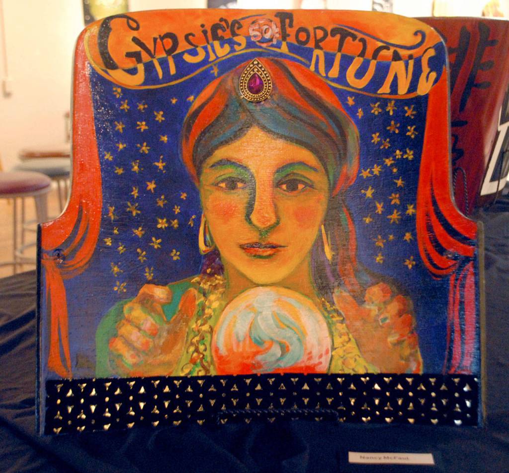 A seat back decorated by area artist Nancy McFaul sits on display at Studio Bob in Port Angeles. (Keith Thorpe/Peninsula Daily News)