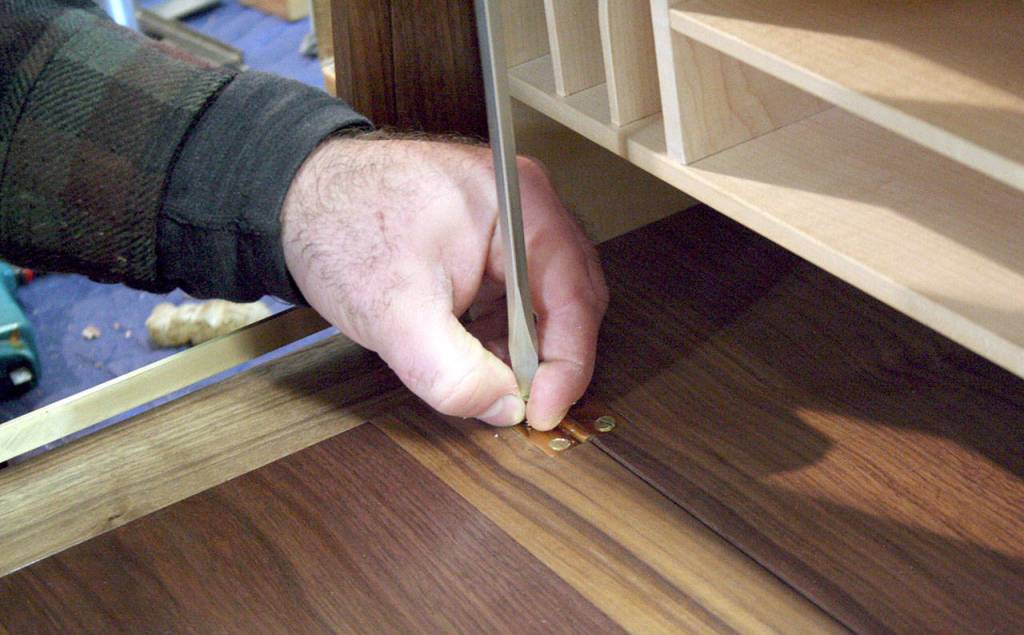 Straughn-Morse pays attention to detail but uses geometry instead of math. Its precision over accuracy, he said. He prefers solid wood such as black walnut, cherry, maple, poplar and ash. (Brian McLean/Peninsula Daily News)