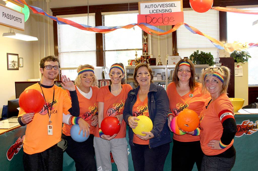 Employees of the Jefferson County Auditors Office dressed as dodgeball players to celebrate Halloween. Pictured are Max Kurtz, left, Quinn Grewell, Tessa Rasmussen, Betty Johnson, Barb Ferguson and Brenda Huntingford. (Zach Jablonski/Peninsula Daily News)