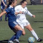Peninsulas Sam Oliveira, right, out-maneuvers Whatcoms Jayden Nguyen during a match in September.                                Keith Thorpe/Peninsula Daily News