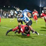Chimacums Anson Jones is tackled by Port Townsends Tanner Woodley during the Quimper Quarrel football game last Friday at Memorial Field. (Steve Mullensky/for Peninsula Daily News)