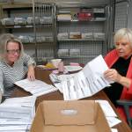 Election workers Ame Cochnauer, left, and Connie Miller, both of Port Angeles, sort through uncounted ballots on Tuesday at the Clallam County Courthouse in Port Angeles. (Keith Thorpe/Peninsula Daily News)