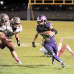Michael Dashiell/Olympic Peninsula News Group Sequims Garrett Hoesel runs with the football during a win over Hoquiam.