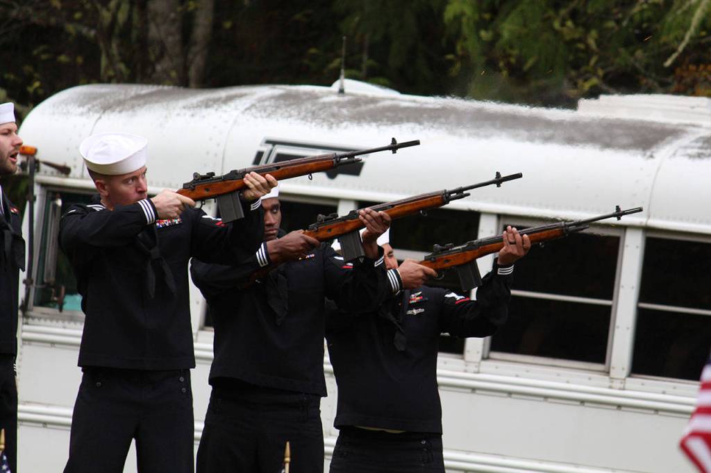 Members of the Funeral Honors detail of Naval Base Kitsap perform the 21-gun salute during the honor ceremony held for Shields. (Zach Jablonski/Peninsula Daily News)