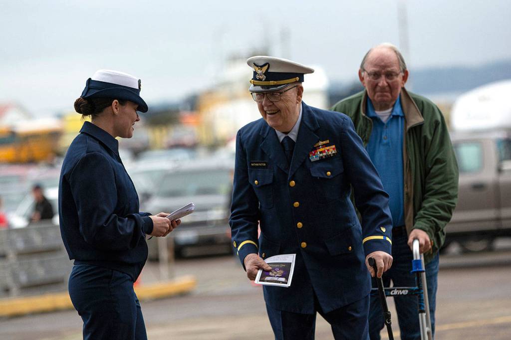 Nathan Patton arrives to the Veterans Day ceremony at U.S. Coast Guard Air Station/Sector Field Office Port Angeles on Monday. (Jesse Major/Peninsula Daily News)