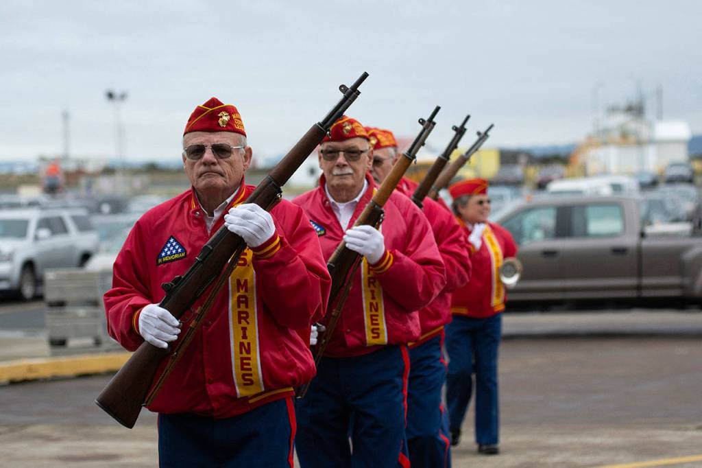 Members of the Mount Olympus Detachment of the Marine Corps League before the Veterans Day ceremony at U.S. Coast Guard Air Station/Sector Field Office Port Angeles on Monday. (Jesse Major/Peninsula Daily News)