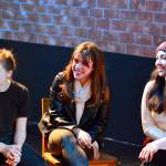 Our Town cast members  from left, Trillium Burbank, Pascal Sanok and Julia Neville  discuss the show before rehearsal at Port Townsend High School. (Diane Urbnai De La Paz/for Peninsula Daily News)