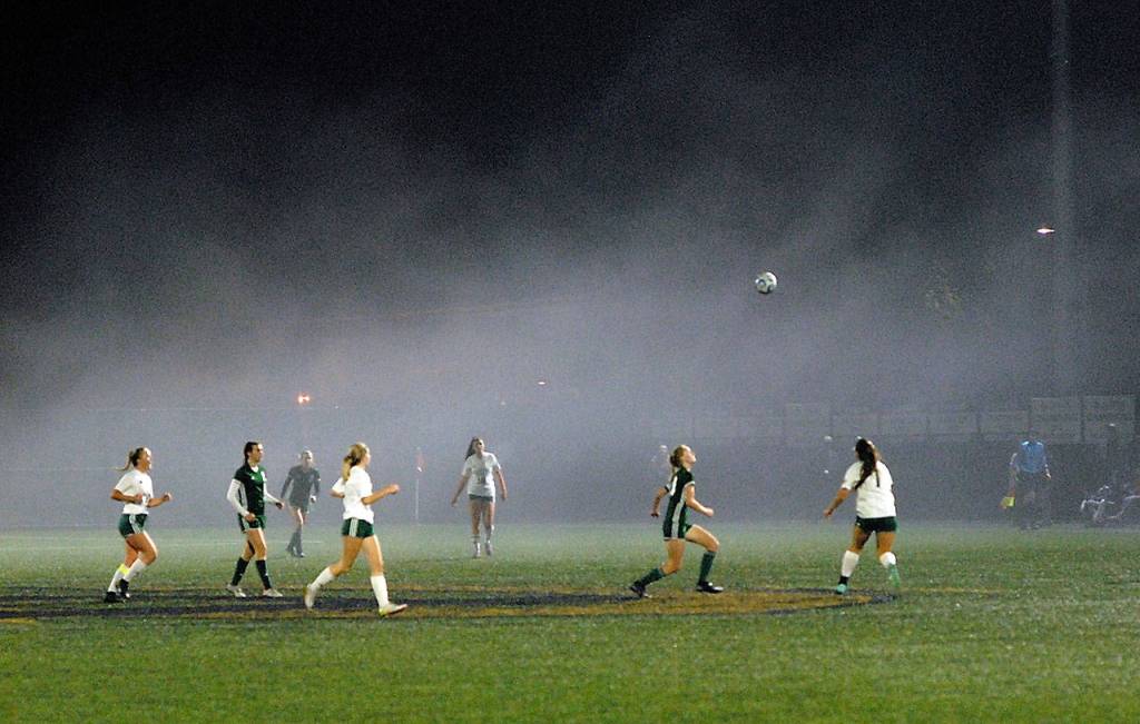 Fog rolls in on Wally Sigmar Field at Peninsula College during Tuesdays first-round playoff pitting Port Angeles against Sehome. (Keith Thorpe/Peninsula Daily News)