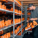 Scott Rensmon of the Harbor City, Calif.-based Ice-America organizes ice skates that will be available for rental at the Port Angeles Winter Ice Village. (Keith Thorpe/Peninsula Daily News)