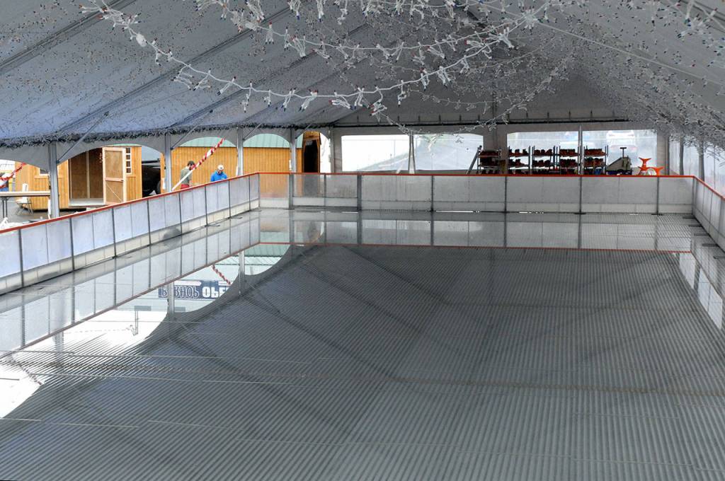 Ice begins to form after the rink was filled with water and the chillers activated. (Keith Thorpe/Peninsula Daily News)