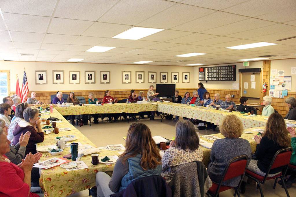 Approximately 40 members of the Brinnon-Quilcene Garden Club, grant recipients and guests gathered at the Quilcene Community Center, as the Garden Club handed out grant checks to 14 community organizations for a total of $5,800. (Zach Jablonski/Peninsula Daily News)