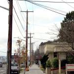 The upper most power lines along Water Street will be coming down starting after Jan. 1, as the Jefferson County Public Utility District works to finish its wire undergrounding project that was started in 2016. (Zach Jablonski/Peninsula Daily News)