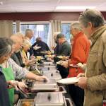 A team of more than 80 volunteers helped serve the attendees of the Tri Area Community Meals Thanksgiving Dinner at the Tri Area Community Center on Thursday afternoon. (Zach Jablonski/Peninsula Daily News)