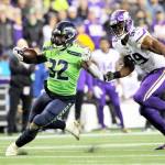 Seattle Seahawks Chris Carson runs on a 26-yard carry as Minnesota Vikings Danielle Hunter pursues during the second half of an NFL football game, Monday, Dec. 2, 2019, in Seattle. (AP Photo/Ted S. Warren)