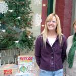 Mickey Griffith, left, and store owner Heidi Hoglund of Olympic Art and Office were presented the first-place Gold Award in the Port Townsend Main Street Programs annual holiday window display contest. (Brian McLean/Peninsula Daily News)