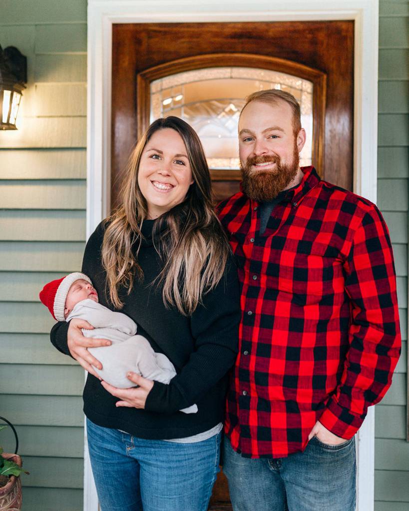 Cortland and Libby Waldron of Port Angeles with their infant child, Henry James Waldron. (Amith Dutta/Lens and Legends Photography)