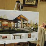 Designers of the Jamestown SKlallam Tribes proposed medicine-assisted treatment facility reveal conceptual drawings last week in Sequim. At right is Bud Turner, manager of the Jamestown SKlallam Tribes carving shed. Michael Dashiell/Olympic Peninsula News Group