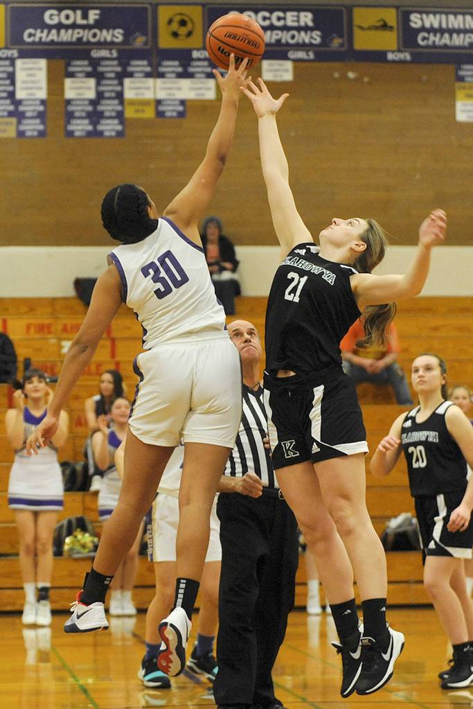 Sequims Jayla Julmist, left, vies for the opening tip during a girls basketball game against Klahowya earlier this season. Sequim will stay a Class 2A member of the Olympic League, while Klahowyas classification status is up in the air for the 2020-2024 prep seasons. (Conor Dowley/Olympic Peninsula News Group)
