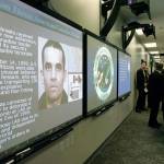 Known terrorist Ahmed Ressam is displayed on a giant monitor at the Los Angeles Joint Regional Intelligence Center in Norwalk, Calif. on July 27, 2006. (Nick Ut/The Associated Press, file)