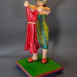 Drew Elickers Woman Looking at Dress is part of the Touching Color exhibit at the Ferguson Gallery inside the Jefferson Museum of Art & History. (Jefferson County Historical Society)