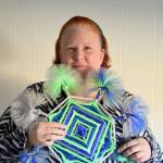 A friend made Seahawks-hued gods eyes ornaments for Linda Perry, a devoted Hawks fan in Port Angeles. (Diane Urbani de la Paz/for Peninsula Daily News)