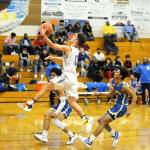 Sequims Dallin Despain (0) goes up for a layup against Bremerton in Sequim on Tuesday. (Conor Dowley/Olympic Peninsula News Group)