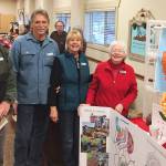 The Sequim Botanical Garden Society will hold a Surprise Peony Pack Fundraising Effort on Saturday at the Sequim Farmers Market Holiday Fair. Pictured, from left, are society members John Hassel, Randy Smith, Sherry Smith and Dona Brock.