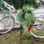 A white bicycle stands at the corner of 19th and Landes streets as a memorial for Marcus Henthorn, who died after he was struck in the intersection by a car driven by Patrick Cleon McConnell of Port Townsend in March 2018. A photo of Henthorn is underneath a wreath. (Brian McLean/Peninsula Daily News)