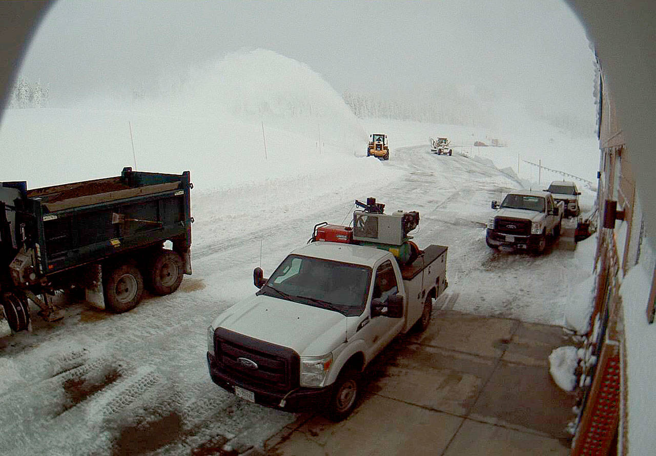Olympic National Park crews scramble to clear the Hurricane Ridge Road on Saturday after a winter storm dropped more snow on the area, as pictured in this park webcam shot. The hope is that the Ridge, which was closed on Friday and Saturday, will be open for rope tow skiing today.