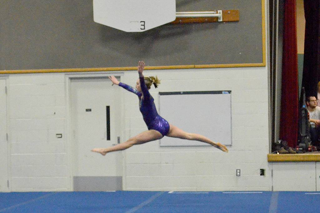 Sequims Gracie Sharp competes in the floor exercise during a meet with Kingston on Friday. (Jackie Mangano)