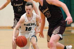 PREP BASKETBALL: Roughriders clutch in final moments in 63-62 win