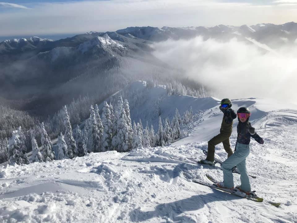 All ages of skiers and snowboarders enjoy the opening day for winter activities at Hurricane Ridge on Sunday. (Jerry Oakes)
