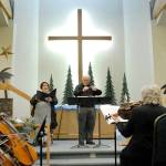 Soloist Vicki Helwick sings under the direction of conductor Jerome L. Wright during Saturdays singalong performance of Handels Messiah at Trinity United Methodist Church in Sequim. (Keith Thorpe/Peninsula Daily News)