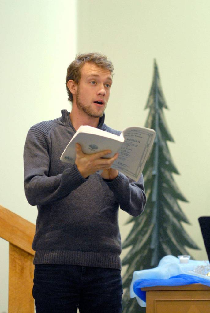 Tenor Nicholas Fritschler solos on Comfort Ye My People during the first part of Messiah at Trinity United Methodist Church. (Keith Thorpe/Peninsula Daily News)
