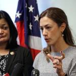Rep. Pramila Jayapal, D-Wash., left, looks on as Negah Hekmati speaks about her hours-long delay returning to the U.S. from Canada with her family days earlier during a news conference Monday in Seattle. Civil rights groups and lawmakers were demanding information from federal officials following reports that dozens of Iranian-Americans were held up and questioned at the border as they returned to the United States from Canada over the weekend. (AP Photo/Elaine Thompson)