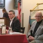 Port Angeles School District levy proponent Jim Haguewood, left, and opponent Dan Shotthafer field questions in a Port Angeles Business Association forum Tuesday at Joshuas Restaurant. District voters will consider the five-year, $52.6 million levy in a special election Feb. 11. (Rob Ollikainen/Peninsula Daily News)
